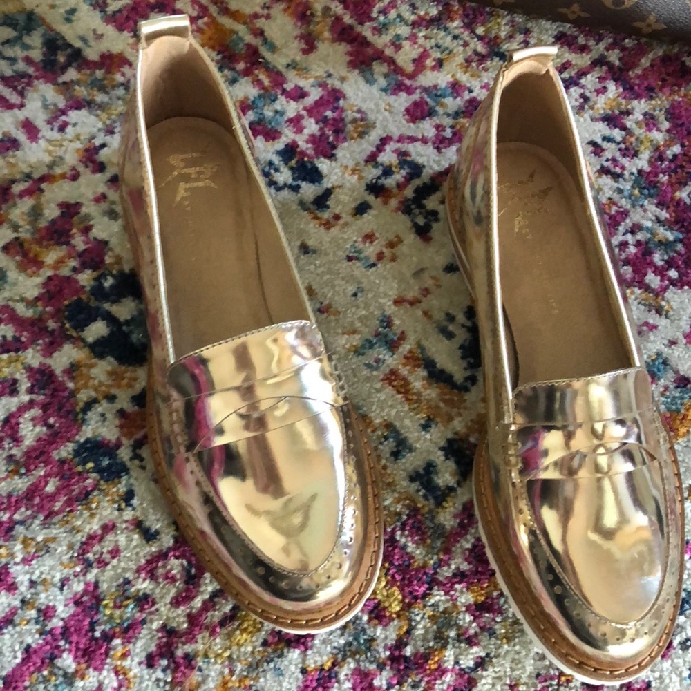 New unworn Gold Loafers